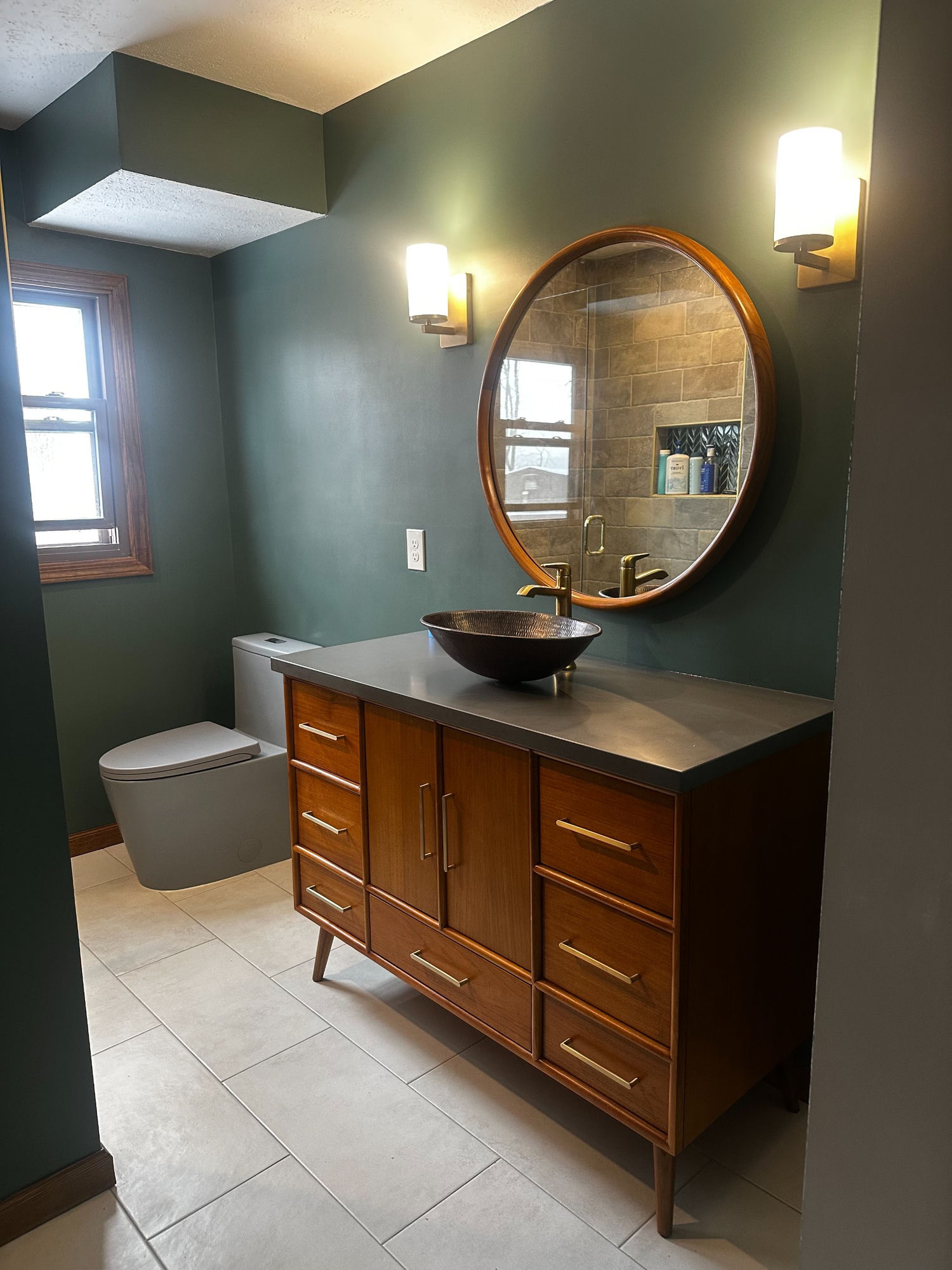 Finished bathroom remodel with vessel sink and custom vanity — Nelson Remodeling